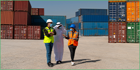 Press release for Coface's September 2021 Focus on the United Arab Emirates. The photos show three business people discussing in a shipping container yard. 